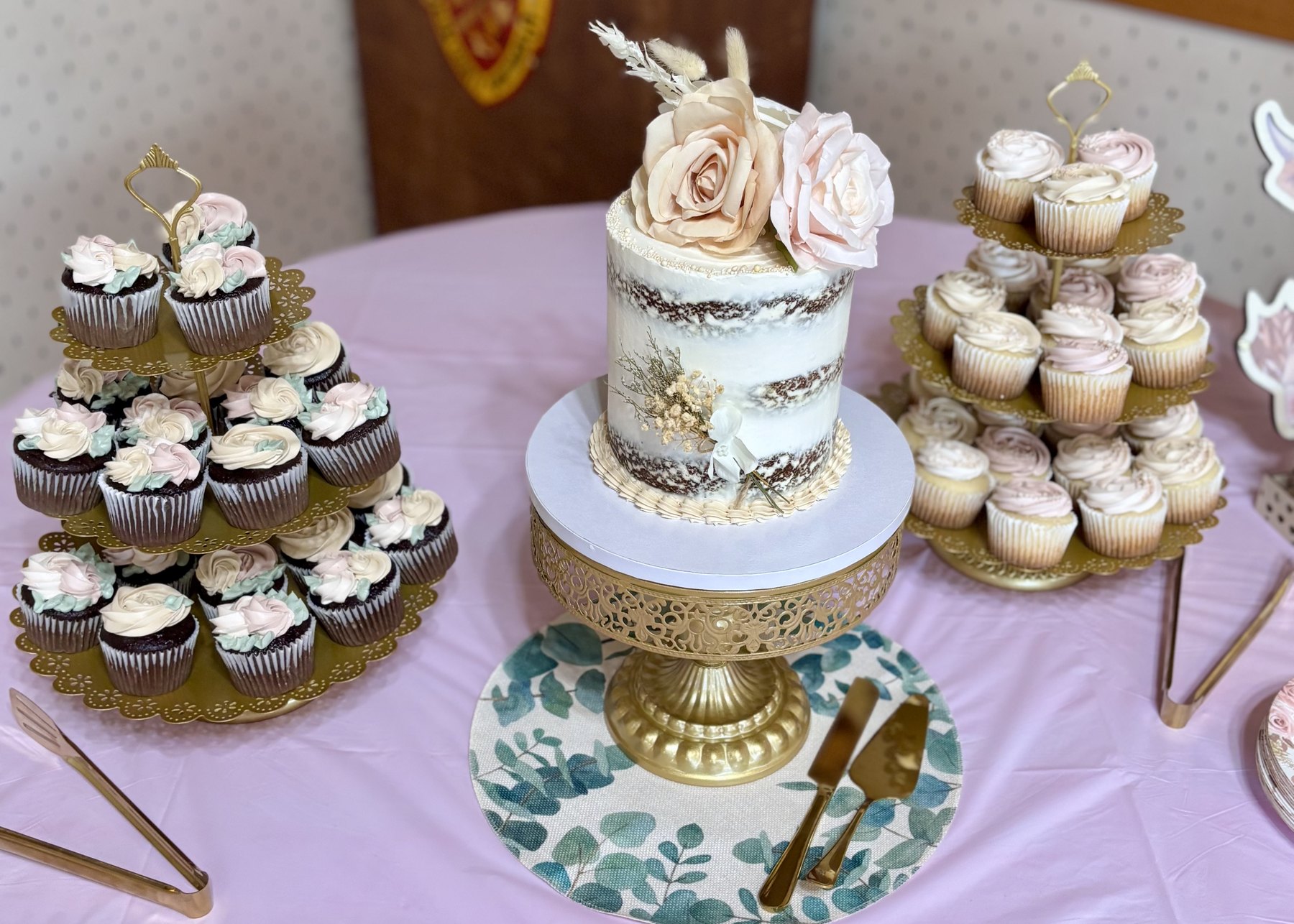 Dessert display with custom cake and cupcake stands